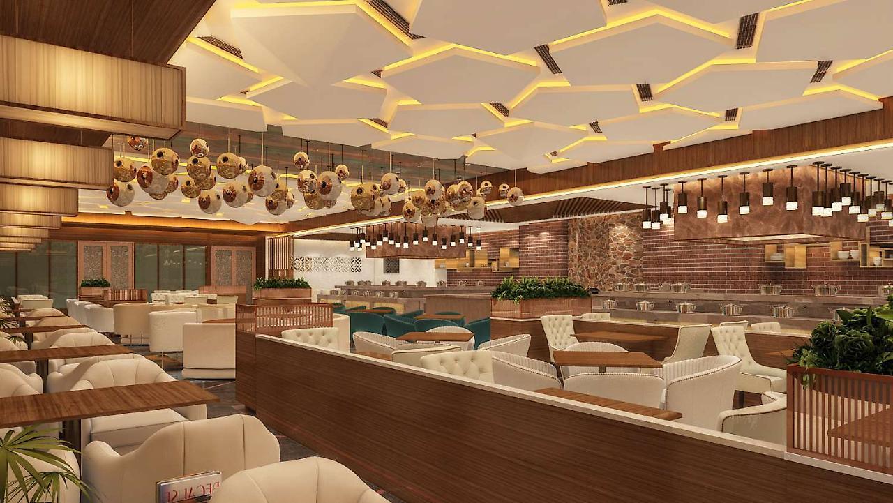 Hotel Radisson Blu Towers Kaushambi Delhi NCR Ghaziabad Exterior foto Interior of a restaurant