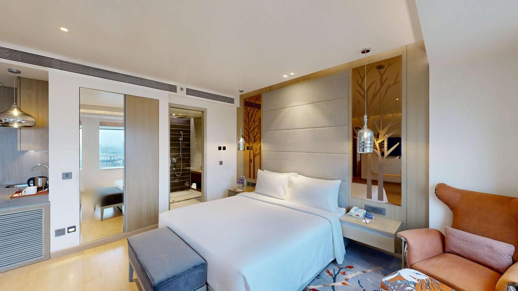 Hotel Radisson Blu Towers Kaushambi Delhi NCR Ghaziabad Exterior foto A bedroom at the hotel